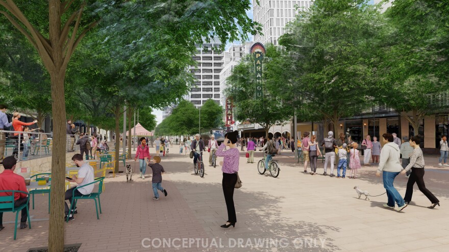 In this rendering of a reimagined Congress Avenue, people walk on a plaza in front of the Paramount Theatre. 