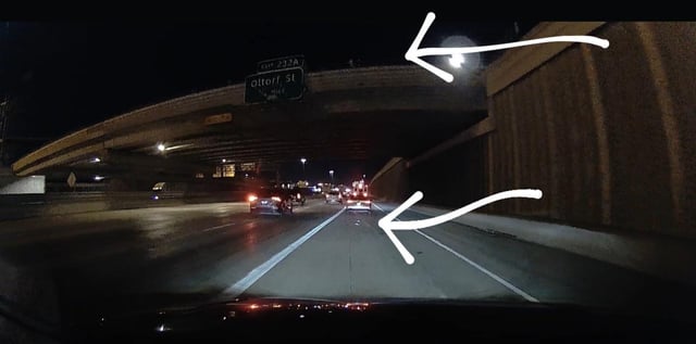 Person Throwing Rocks from I-35 Overpass