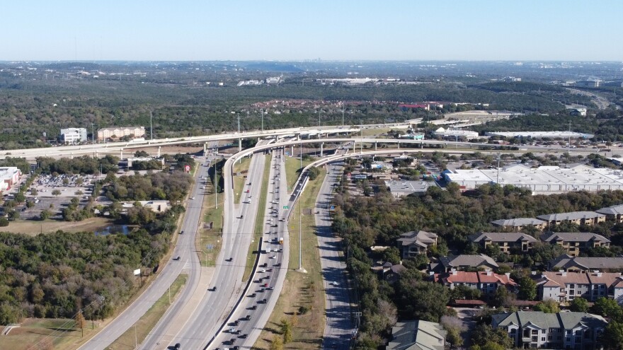 An aerial view of the existing US 290 and MoPac interchange showing current traffic patterns.