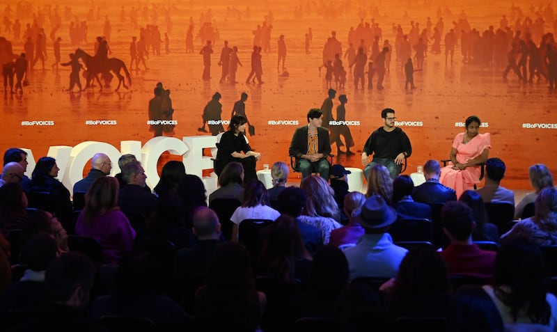 Laurie Parsons, Beto Bina and Abiramy Sivalogananthan on stage at BoF VOICES.