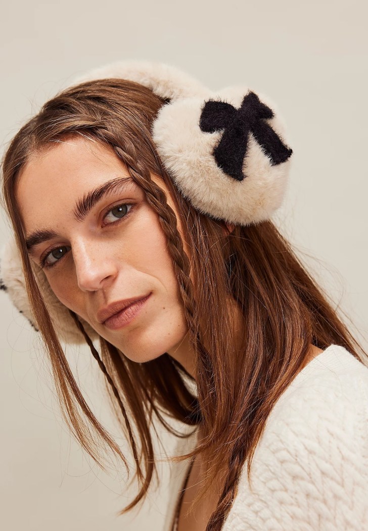 fuzzy faux fur ear muffs unique Christmas gift wishlist ideas with a black bow pattern