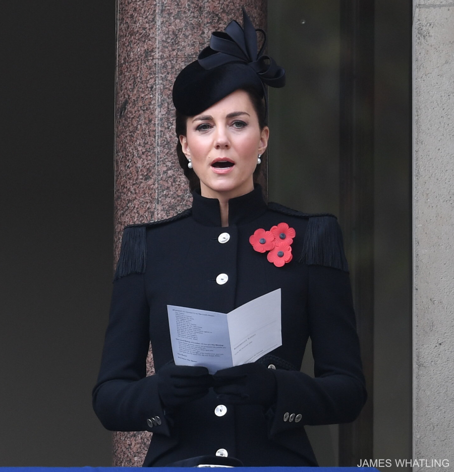 The Princess looks regal as she sings during the National Service of Remembrance, wearing a military-inspired coat by Catherine Walker