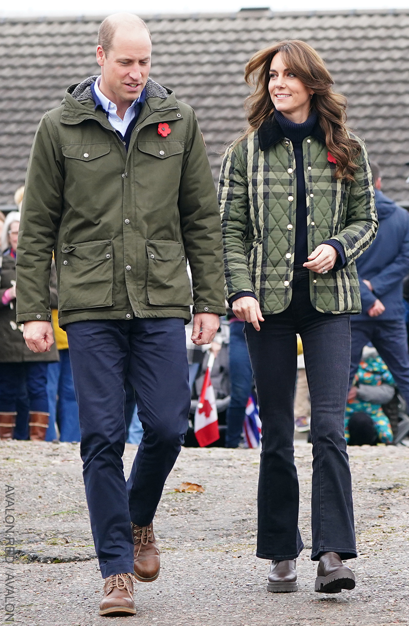 Kate Middleton wears blue flared jeans with brown boots and a check jacket