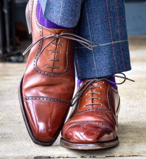 When full grain leather shoes are bent over the vamp, the dense grain can't go anywhere but fold into creases.