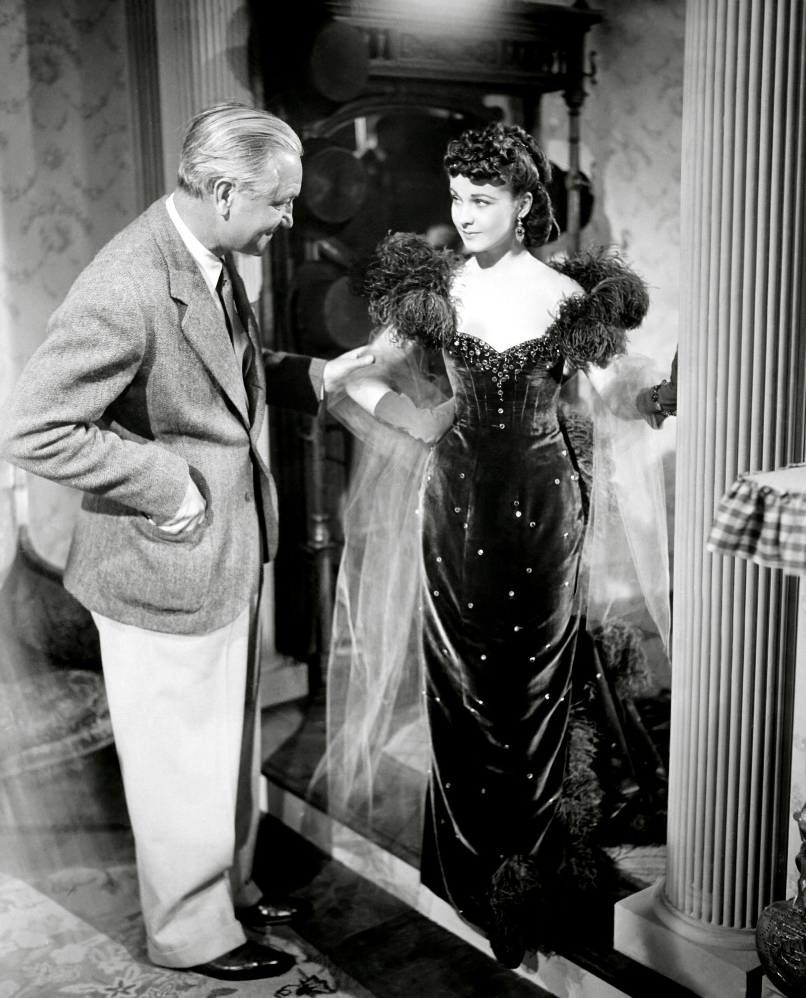 Image may contain Victor Fleming Vivien Leigh Person Clothing Coat Dress Adult Wedding Formal Wear Suit and Face